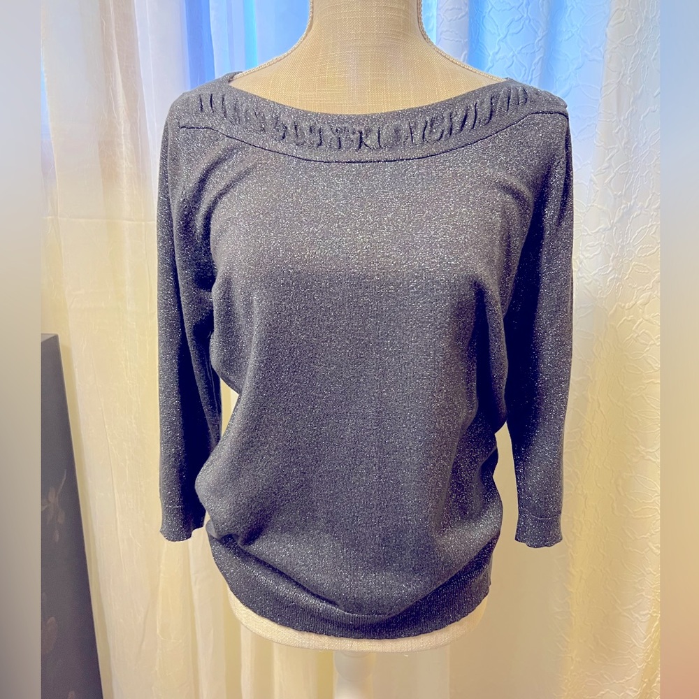 Women’s silver sparkling 3/4 sleeve length sweater.